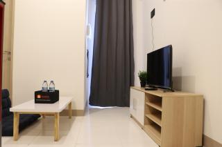 Comfort and Minimalist 2BR Apartment Tokyo Riverside PIK 2 By Travelio - Rawalembang - 2