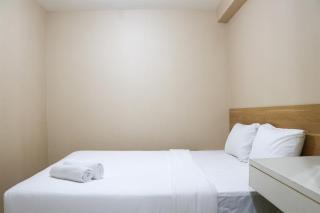 Cozy Living and Tidy 2BR Green Bay Pluit Apartment By Travelio - 6