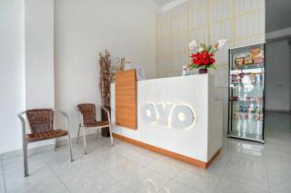OYO Life 1299 Balcony Orange Homestay - Palembang - 8
