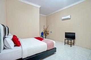 OYO 93033 Mutiara Homestay Syariah Near TPA / TPSA Nurul Yakin - Payakumbuh - 1