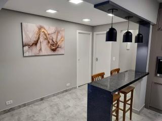 Amplo apartamento na quadra mar - 1