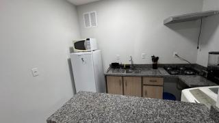 Kitnet localizado 6 min shopping - 2