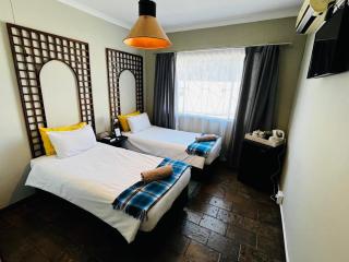Kate's Nest Guesthouse & Backpackers - 8