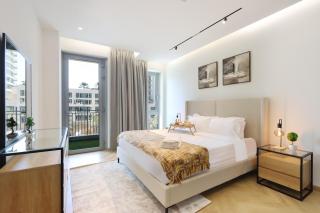 Livbnb - 2B with Modern Interiors, Emaar Boulevard - Dubai - 7