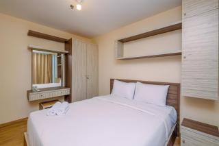 Comfortable and Warm 2BR at Tifolia Apartment By Travelio - 0