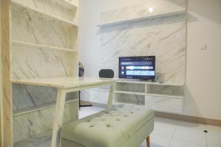 Well Furnished and Homey 2BR Tokyo Riverside PIK 2 Apartment By Travelio - 1