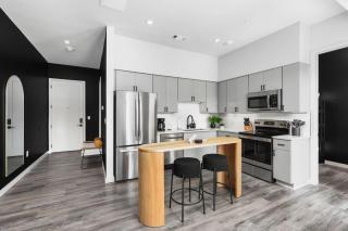 Chic Music Row Condo Rooftop Deck with City View Gym Office and More - 1