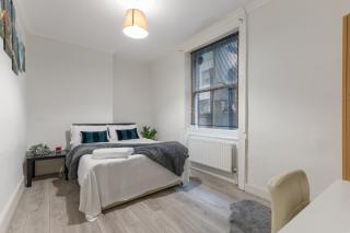 Cozy City Retreat with 4 bedrooms for up to 10 guests - Londra - 3