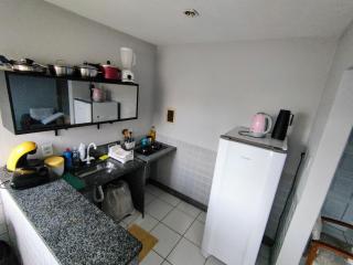 Ed Bertholi - Vista lateral do mar com garagem - 4