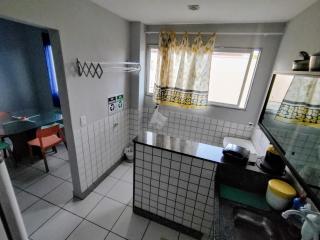 Ed Bertholi - Vista lateral do mar com garagem - 3