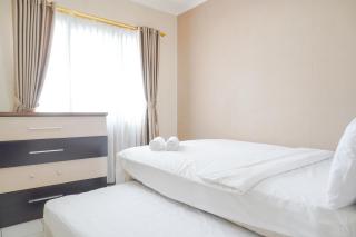 Cozy and Simply Look 2BR at 12nd Floor Puri Garden Apartment By Travelio - 3