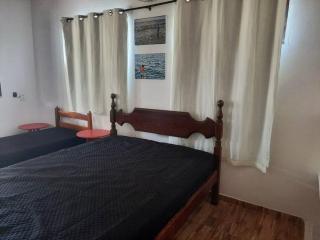 Casa a poucos metros da praia em condomínio - 2