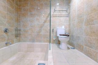 Spacious 3BR at Kemang Village Apartment By Travelio - 1