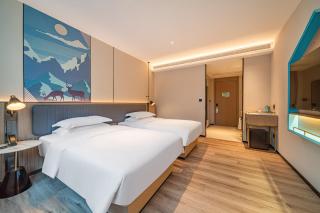 Echarm Hotel Guangzhou Baiyun Station Julong Metro Station - Canton - 8
