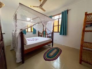 Stylish 2 Bedroom Apt - 1min walk to the Indian Ocean - Umbuji - 4