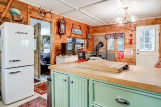 Rustic Waterfront Cottage with Fire Pit and Kayaks - 1