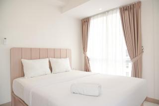 Best Deal and Homey 2BR Tokyo Riverside PIK 2 Apartment By Travelio - Rawalembang - 0