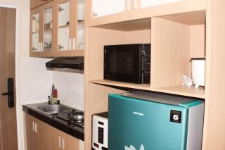 Elegant and Strategic Loft Studio Apple 1 Condovilla Apartment By Travelio - Jakarta - 6