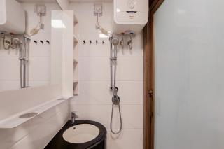 Comfortable and Simply Studio Room at Sky House BSD Apartment By Travelio - 8