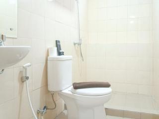 Comfortable and Tidy 2BR at Vida View Apartment By Travelio - 1