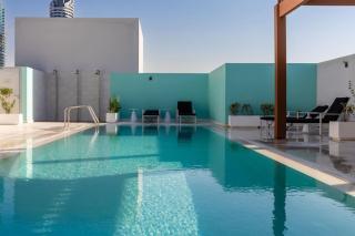 Waves - Refined Studio with Balcony & City Views in Luma21 - Dubai - 6