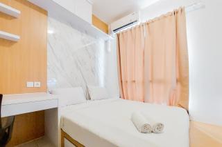 Modern Look and Compact Studio at Sky House Alam Sutera Apartment By Travelio - Tangerang - 1