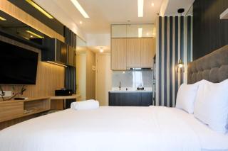 Warm Studio with Access to Mall at Anderson Supermall Mansion Apartment By Travelio - Surabaya - 5