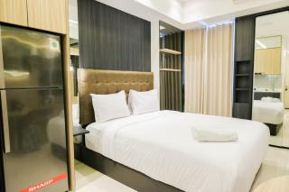 Warm Studio with Access to Mall at Anderson Supermall Mansion Apartment By Travelio - Surabaya - 9
