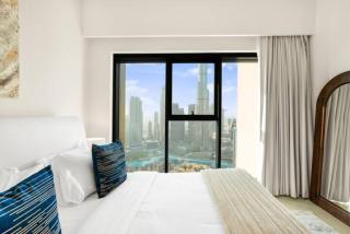 Exclusive 4 Bedroom Apartment I Burj Khalifa and Fountain Views I Free Wi-Fi, Pool, Gym & Parking I by Meerak - Dubai - 3