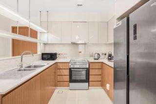 Exclusive 4 Bedroom Apartment I Burj Khalifa and Fountain Views I Free Wi-Fi, Pool, Gym & Parking I by Meerak - Dubai - 1