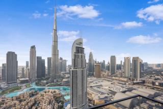 Exclusive 4 Bedroom Apartment I Burj Khalifa and Fountain Views I Free Wi-Fi, Pool, Gym & Parking I by Meerak - Dubai - 0