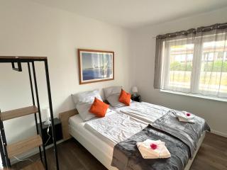 Ferienwohnung "Calypso" Papenburg Ebenerdig Terrasse Einbauküche Neubau 84 qm Free Wifi 2 Schlafzimmer - Papenburg - 6