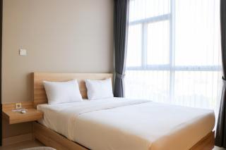 Wonderful and Homey 1BR Ciputra International Apartment By Travelio - 0