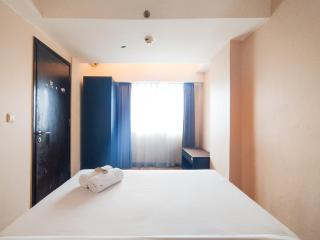 Tranquil Designed 2BR at Braga City Walk Apartment By Travelio - Bandung - 8