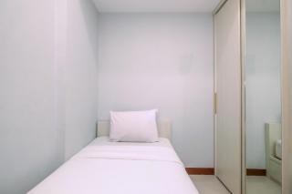 Comfortable and Simply Look 2BR Royal Heights Apartment By Travelio - Bantarkamang - 3