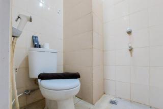 Homey and Tidy Studio Serpong Greenview Apartment By Travelio - Tangerang - 6