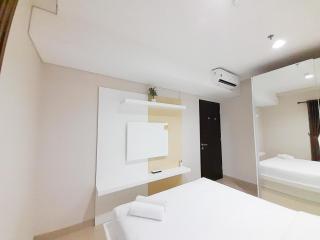 Minimalist and Cozy 1BR at Patraland Amarta Apartment By Travelio - Kejayan - 3