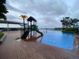 Elegant and Homey Studio at Amartha View Apartment By Travelio - Semarang - 2