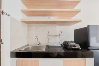 Fully Furnished and Homey Studio Serpong Garden Apartment By Travelio - 1