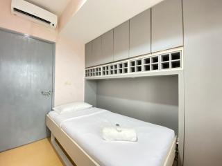 Cozy Stay and Serene Designed 2BR at Braga City Walk Apartment By Travelio - Bandung - 7