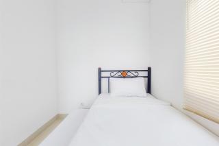 Fully Furnished with Cozy Designed 2BR Serpong Garden Apartment By Travelio - 1