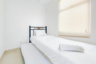 Fully Furnished with Cozy Designed 2BR Serpong Garden Apartment By Travelio - 9