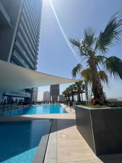 Skyline Serenity At Bloom Heights 1br City-view - Dubai - 2