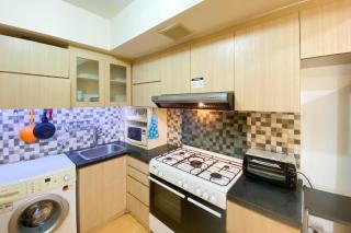 Cozy and Modern Look 2BR The Wave Kuningan Apartment By Travelio - Jakarta - 2