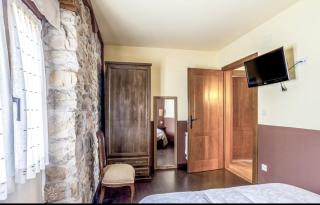 La Tienda de Abajo - Apartamentos acogedores con calefacción, parking y vistas al Valle de Soba - 2