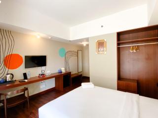 Homey Studio No Kitchen at Gateway Park LRT City Bekasi Apartment By Travelio - Bekasi - 8