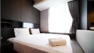 Modern and Cozy 2BR at Grand Sungkono Lagoon Apartment By Travelio - Surabaya - 9