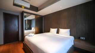 Modern and Cozy 2BR at Grand Sungkono Lagoon Apartment By Travelio - Surabaya - 3