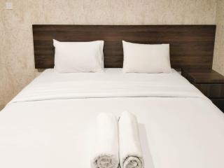Comfort and Simply 1BR at Patraland Amarta Apartment By Travelio - Beran-kidul - 2