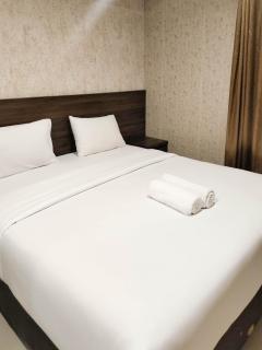 Comfort and Simply 1BR at Patraland Amarta Apartment By Travelio - Beran-kidul - 0